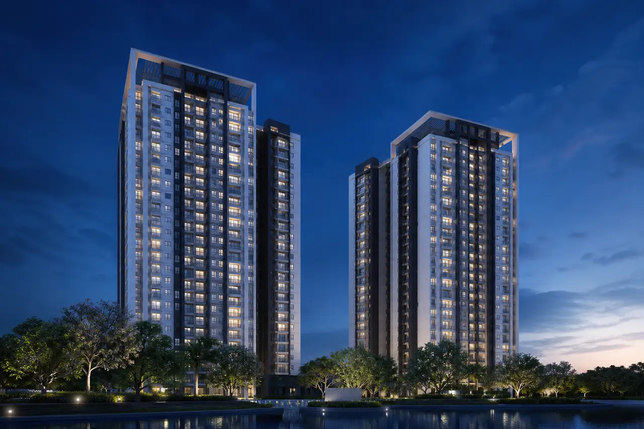 Two contemporary residential towers seen at twilight